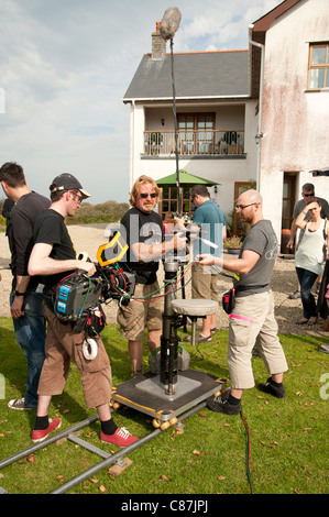 A camera crew working on the location recording of a television drama series, UK Stock Photo