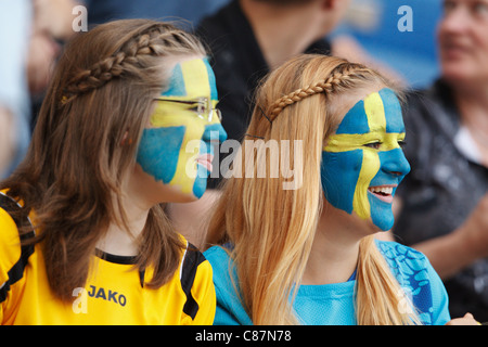 Young Sweden supporters watch the action at the 2011 FIFA Women's World Cup third place match between France and Sweden. Stock Photo