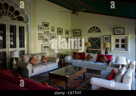 Rohet Garh fortress palace hotel salon drawing room with photographs of aristocratic ancestors Rohet, Rajasthan, India Stock Photo