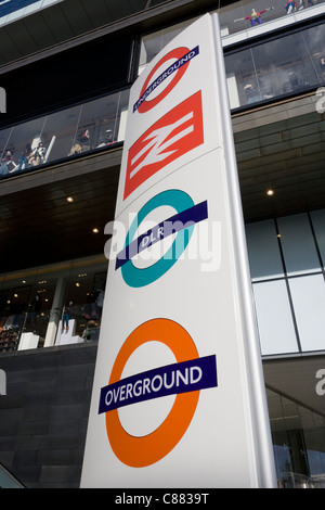 London transport logos on pillar at Westfield City shopping centre in Stratford, home of the 2012 Olympics. Stock Photo