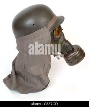 German gas mask M38 and anti gas neck shield worn with combat helmet M40 from the second world war. Stock Photo