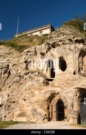 UK, Nottinghamshire, Nottingham, Old Brewhouse Yard sandstone caves in cliff below castle Stock Photo