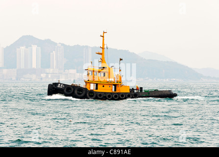 Tugboat Yuen On Underway in Kowloon Bay Victoria Harbour Hong Kong China Asia Stock Photo