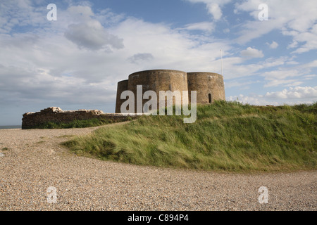 Martello Tower, Slaughden, Aldeburgh, Suffolk, now rented as a holiday let by the Landmark Trust. Evening sunshine and blue sky. Stock Photo