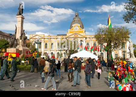 Plaza Murillo, La Paz main square, Bolivia, with loads going on, Congreso nacional in background Stock Photo