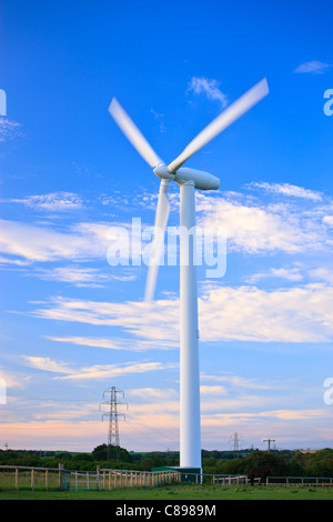 Wind turbine in the evening light Stock Photo