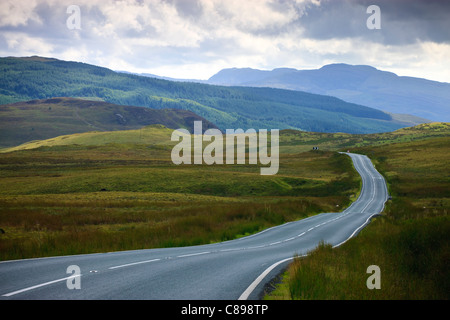 empty road running through rural countryside empty road running through rural countryside