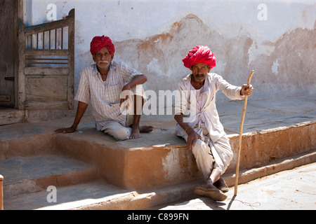 Indian men wearing traditional clothing and Rajasthani turbans in village of Nimaj, Rajasthan, Northern India Stock Photo