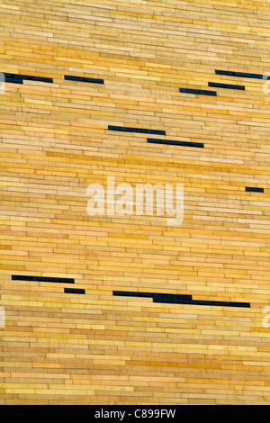 Modern yellow brick wall texture creating a solid pattern Stock Photo