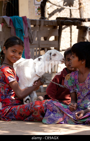 Happy Indian children in typical Rajasthani village of Nimaj, Rajasthan, Northern India Stock Photo