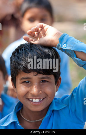 Indian schoolboy attending school at Doeli in Sawai Madhopur, Rajasthan, Northern India Stock Photo