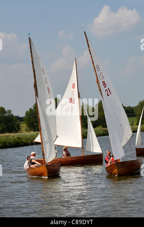 norfolk class dinghies racing on river waveney at beccles suffolk Stock Photo