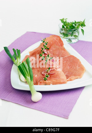 Raw veal escalopes Stock Photo