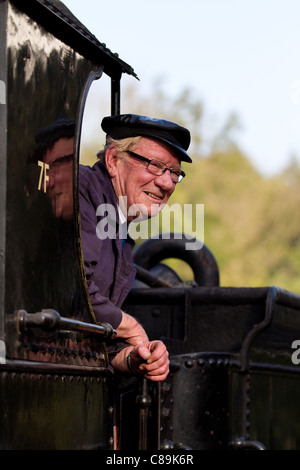 Smiling Train Driver Steam locomotive driver smiling at his cab window, on the Severn Valley ...