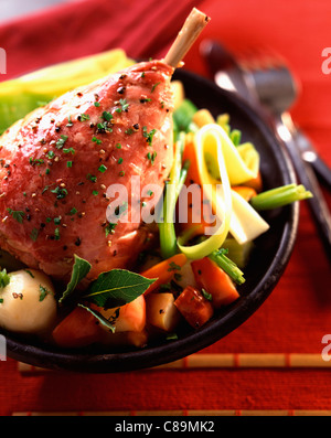 Ham cooked in cider with apples Stock Photo