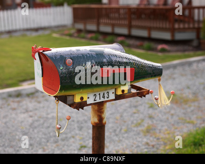 Mailbox shaped like a fish Stock Photo