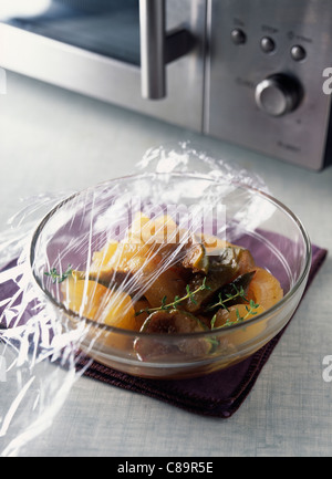 Apples and figs stewed in a microwave oven Stock Photo