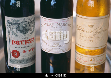 Bottles of wine :Chateau Petrus,Chateau Yquem and Chateau Margaux Stock Photo