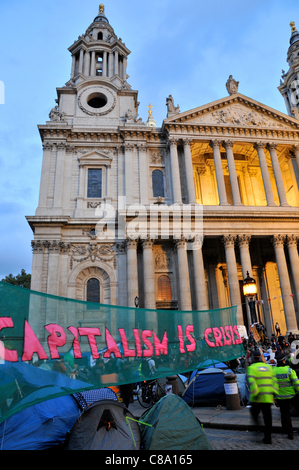 Capitalism is Crisis banner in front of St Paul's Cathedral anti-capitalist protest, Occupy London. Monday 17th October 2011 Stock Photo
