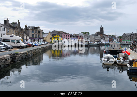 Tarbert harbour and street in Scotland, Uk Stock Photo