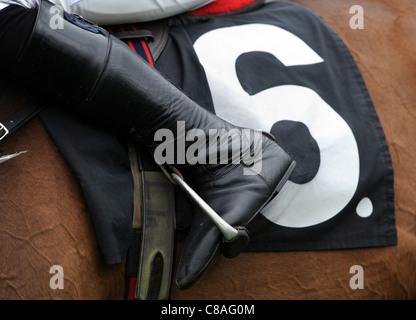 Detail of a Saddle Cloth and Jockeys Boots and Stirrups Stock Photo