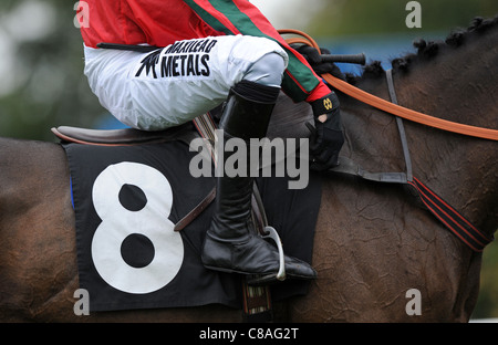 Detail of a Saddle Cloth and Jockeys Boots and Stirrups Stock Photo