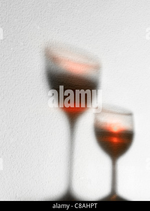 Shadow of glasses of red wine Stock Photo