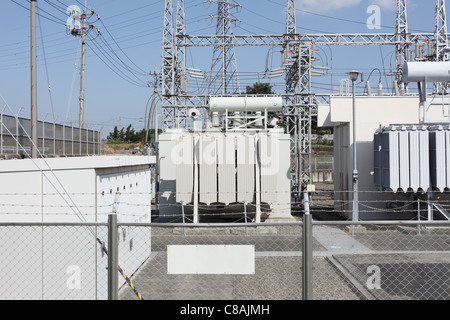 Electrical power transformer in high voltage substation Stock Photo