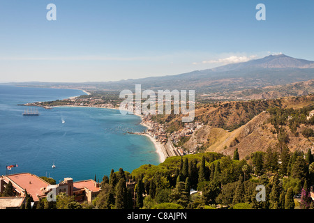 View of Giardini Naxos, Golfo Di Naxos and Mount Etna, from Taormina, Sicily, Italy Stock Photo