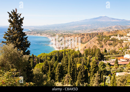 View of Giardini Naxos, Golfo Di Naxos and Mount Etna, from Taormina, Sicily, Italy Stock Photo