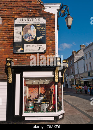 Harveys historic brewery shop and lower High Street shops Lewes East Sussex UK Stock Photo