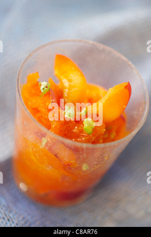 Apricot fruit salad with pistachios Stock Photo