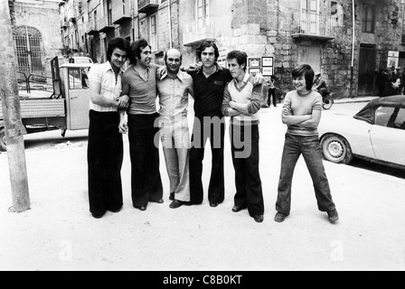 young people in a square in Canicattì,Sicily,Italy,1978 Stock Photo