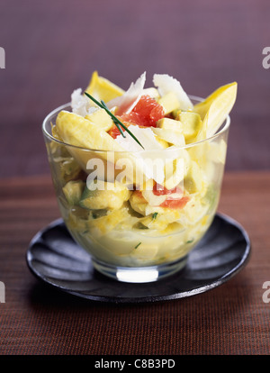 Chicory and pink grapefruit salad with sweet and sour honey dressing Stock Photo