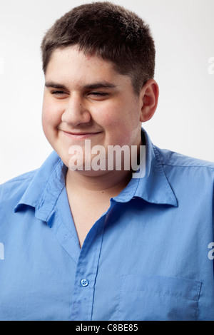 Funny teenage boy with pimples at his face Stock Photo