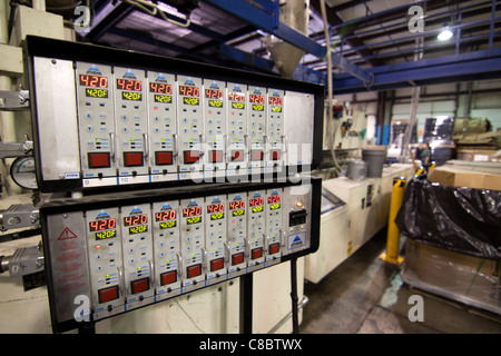 An athena temperature control panel at a plastics molding injection plant in Hudson, Colorado, USA. Stock Photo