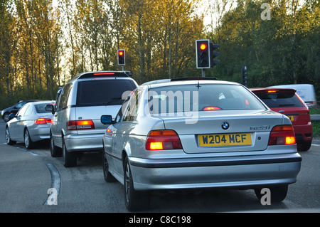 Heavy traffic at lights at M25 Motorway exit, Surrey, Greater London, England, United Kingdom Stock Photo