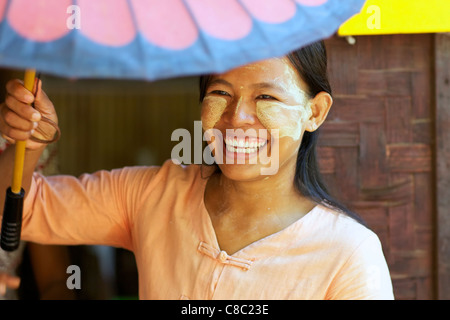 Unidentified woman wearing traditional Thanaka cream in Bagan, Myanmar Stock Photo