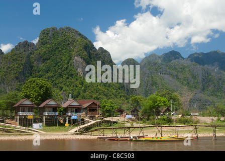 Vang Vieng scene on the banks of the Nam Song river Stock Photo