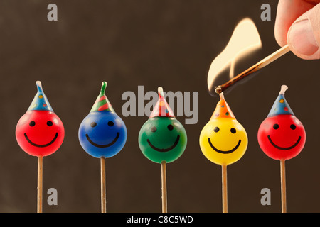 Candles with smiles. Stock Photo