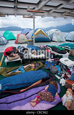 Passengers sleeping in the solarium. Columbia ferry. Alaska Inside Passage. USA Stock Photo