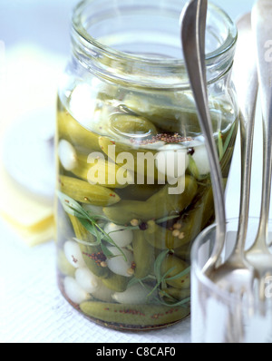 gherkins and baby onions pickled in vinegar Stock Photo