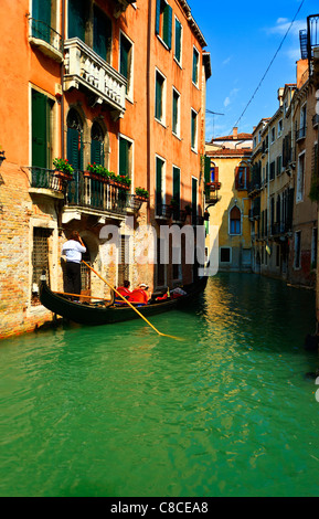 Venice Italy riding in gondola on Canal Venice Italy riding in gondola on Canal