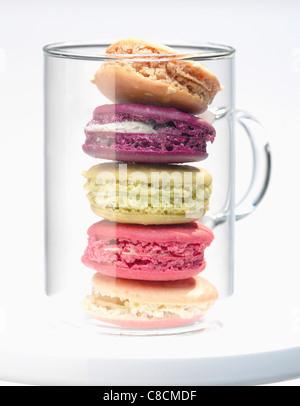 Pile of macaroons in a glass Stock Photo