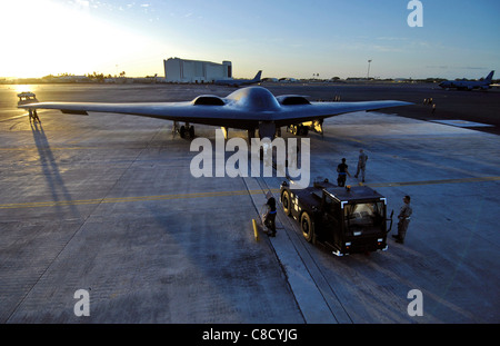 B 2 Spirit Stealth Bomber  is towed to a parking spot at Hickam Air Force Base, Hawaii. Stock Photo