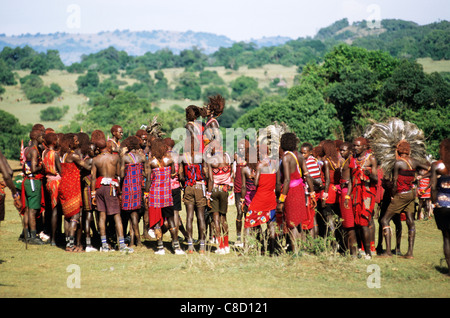 Lolgorian, Kenya. Siria Maasai Manyatta; group of moran doing their traditional 'ipid' jumping dance. Stock Photo