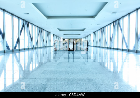 Perspective of the office corridor with escalator Stock Photo