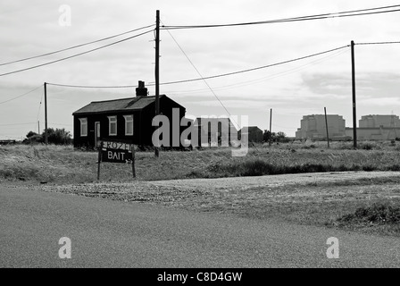 An atmospheric black and white shot typical of the area around Dungeness and New Romney where an old way of life meets the modern Stock Photo