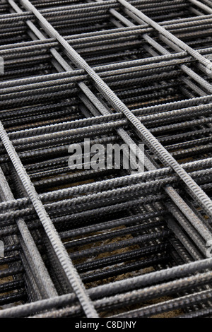 Pile of concrete reinforcement steel meshes on a building construction site Stock Photo