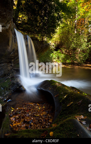 Raper Creek Falls is located in north Georgia in the county of Habersham.  The falls themselves are approximately 15 ft. high and unique in the aspect that the stream is running diagonal across a rock shelf before falling into the plunge pool below. Stock Photo